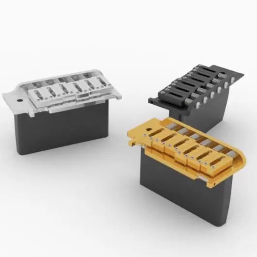 Various finishes of the Hipshot US Flat Plate Tremolo Guitar Bridge