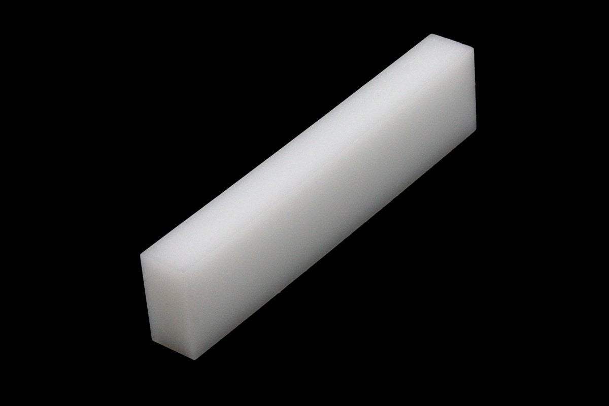 Large Polyester Nut Blank - 2-1/8 x 15/32 x 1/4 inches.